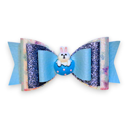 Handmade Blue Faux Leather Glitter Hair Bow with Easter Bunny in Egg, Front view