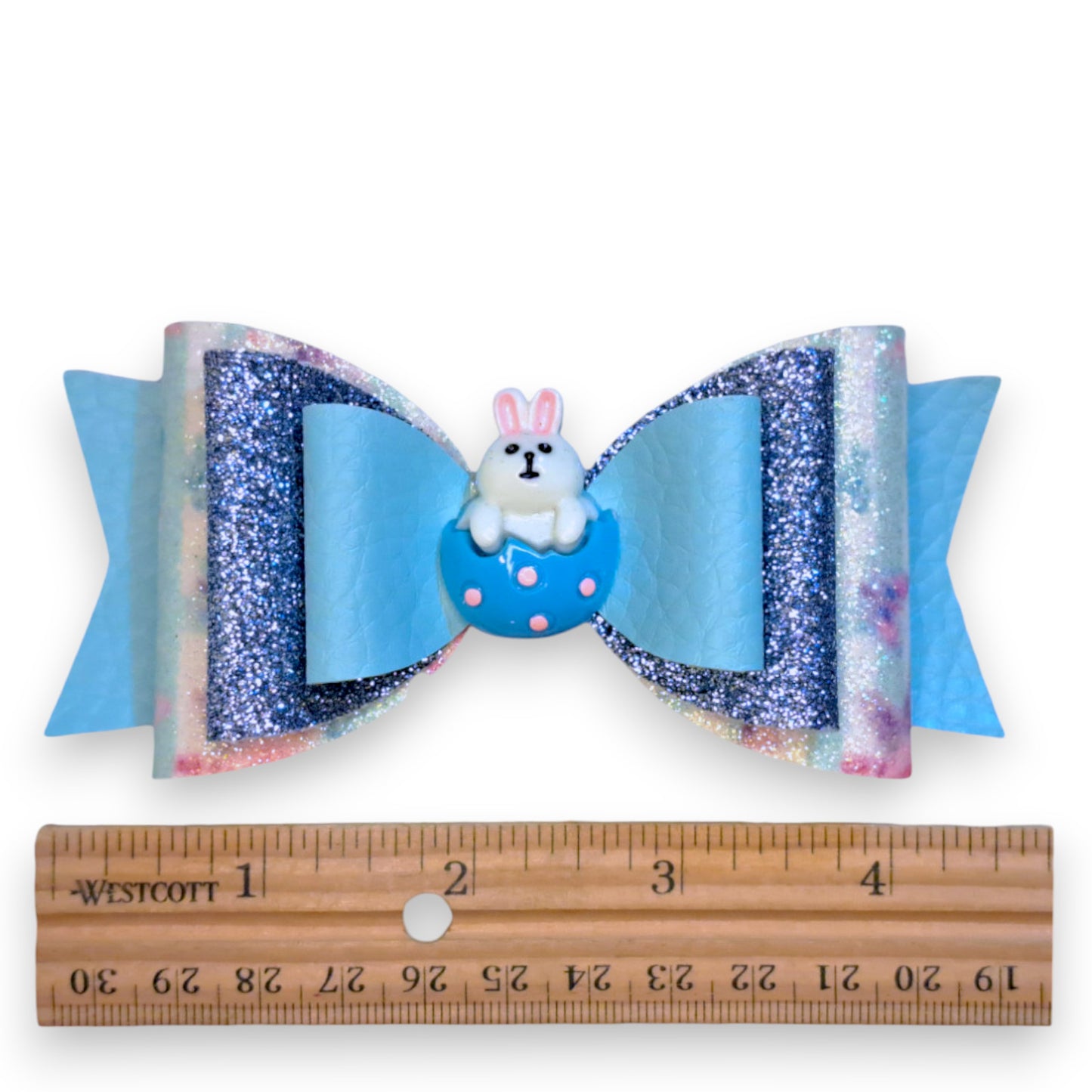 Handmade Blue Faux Leather Glitter Hair Bow with Easter Bunny in Egg, with ruler